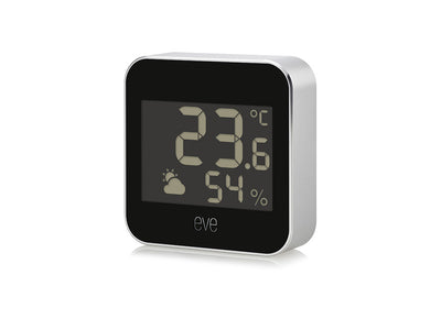 Eve Weather schräg von vorn, silberne Gehäuseseite rechts, Display mit 23,6 °C und 54 % Luftfeuchtigkeit