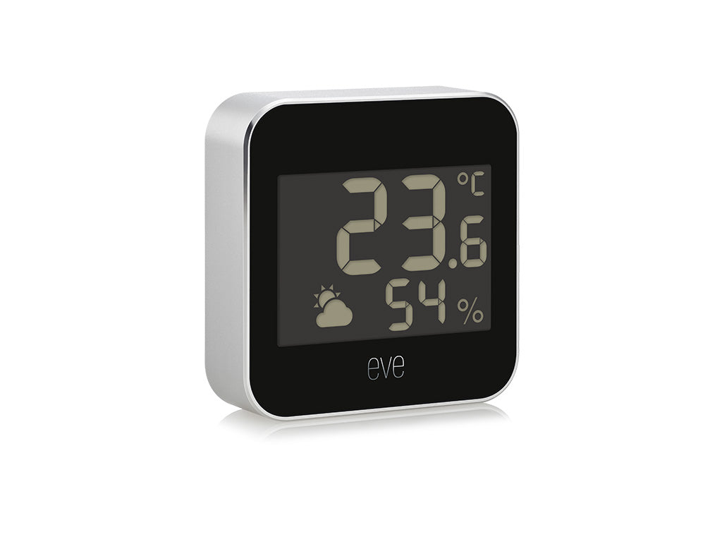 Eve Weather schräg von vorn mit Aluminiumkante links, Anzeige 23,6 °C, 54 % und Sonne-Wolken-Symbol