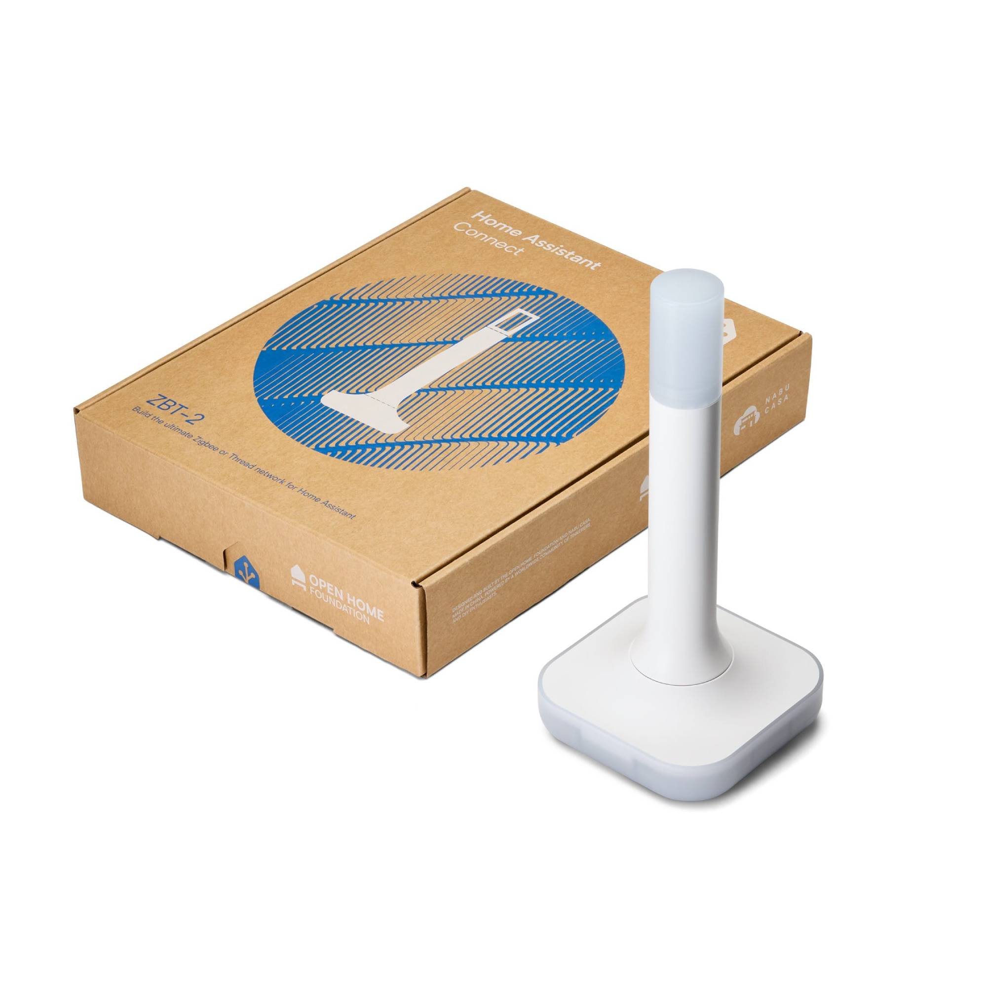 Connect ZBT-2 neben seinem Kraftpapier-Karton mit Nabu-Casa- und Open-Home-Foundation-Logo