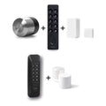 Nuki Smart Lock Pro (5. Gen.) und Nuki Keypad 2 und Nuki Door Sensor u. a. nebeneinander vor weißem Hintergrund