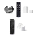 Nuki Smart Lock Pro (5. Gen.) und Nuki Keypad 2 und Nuki Door Sensor u. a. nebeneinander vor weißem Hintergrund