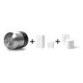 Nuki Smart Lock Pro (5. Gen.) und Nuki Door Sensor u. a. nebeneinander vor weißem Hintergrund