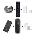 Nuki Smart Lock Pro (5. Gen.) und Nuki Keypad 2 und Nuki Door Sensor und Nuki Fob u. a. nebeneinander vor weißem Hintergrund