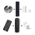 Nuki Smart Lock Ultra und Nuki Keypad 2 und Nuki Door Sensor und Nuki Fob u. a. nebeneinander vor weißem Hintergrund