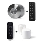 Nuki Smart Lock Ultra und Nuki Keypad und Diebstahlschutz für Nuki Keypad 1 u. a. nebeneinander vor weißem Hintergrund