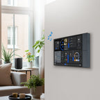Shelly Wall Display XL Grau im Wohnzimmer an der Wand, Musikwiedergabe mit Notensymbolen, Lautsprecher im Hintergrund