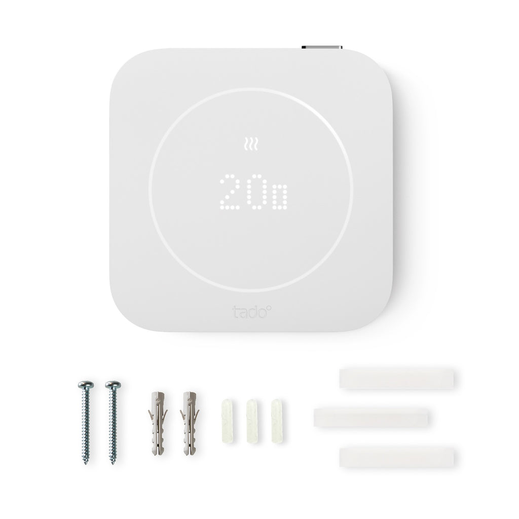 Lieferumfang des Verkabelten Thermostats X (2. Gen.): Thermostat, Schrauben, Dübel, Klebepads und Verkabelungszubehör